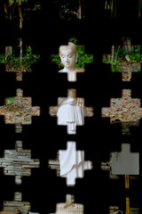 White Buddha after window in  Wat Pha Lat Monk's Trail at Thailand