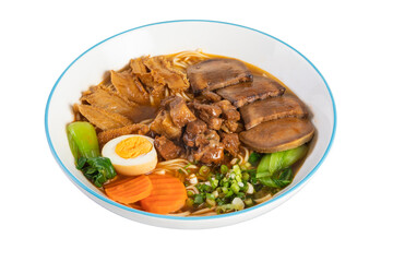 Noodles in soup on a plate