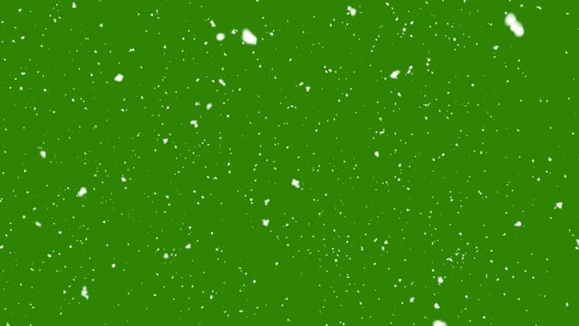 Snow falling on green background