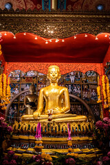 The gold statue of Phra Si Ari Buddha at Wat Lai, Lopburi, Thailand.