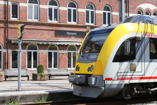 Varnamo, Sweden - June 13, 2022: Passenger train class Y32 in front of the Varnamo railroad station building.