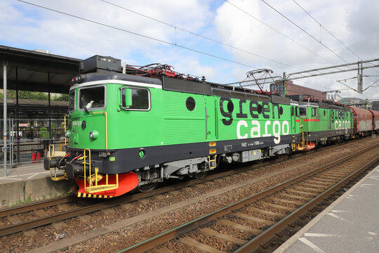 Lund, Sweden - June 15, 2022: One Green Cargo freight train with dualö electric locomotives class Rd2.