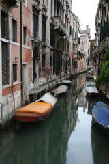 foreshortening of navigable canal of Venice Island in Italy with long exposure effect