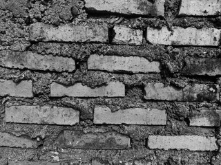 photo of concrete walls and red bricks. black and white photo of red brick and wall. Old brick and cement background and texture