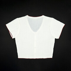 flat White knitwear sweater tshirt shape with red line on the rim on black background in studio light.