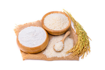 Top view of rice flour, wheat in a wooden bowl, and ears of rice isolated on white background.
