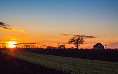 Fototapeta premium sunset over the countryside