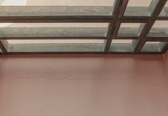 Wooden beams on the terrace of the Arabian building. Summer sunlight and shadows. Minimal boho style.