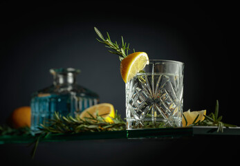 Gin tonic cocktail in a crystal glass.