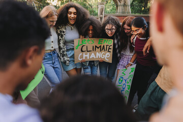 Diverse young people demonstrating against climate change - obrazy, fototapety, plakaty