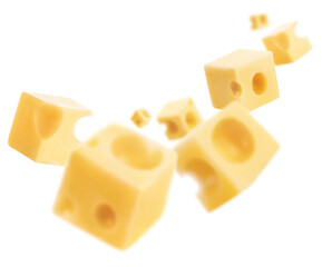 Flying cheese cubes, isolated on white background