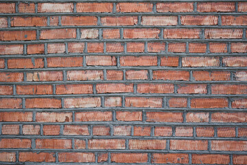 Background of red brick wall . Construction concept