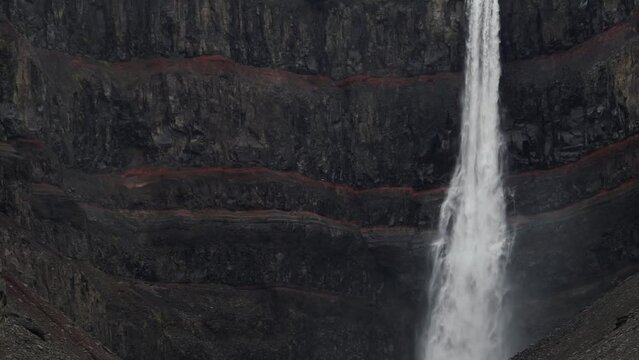 Hengifoss waterfall closeup view in Iceland, slow-mo