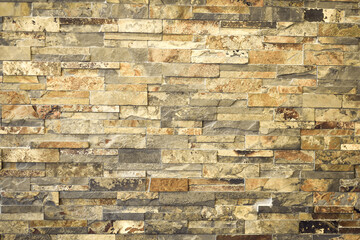 Pattern of rough sandstone wall texture and background