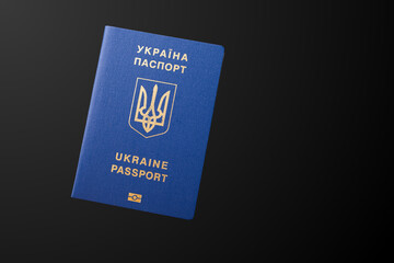 Ukrainian passport on a black background