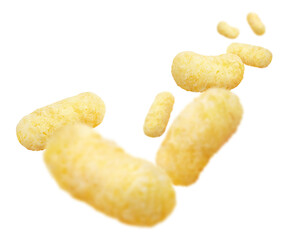 Flying corn sticks, isolated on white background