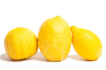 Three lemons isolated on white background. Tropical fruit