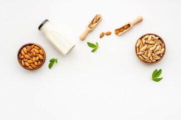 Vegan organic drink - almond milk with almond nuts, top view