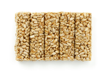 Sweet gozinaki from sunflower seeds on a white background.