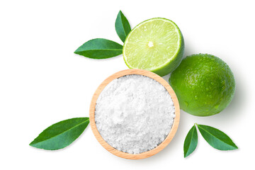 Lime powder in wooden bowl and fresh limes fruit isolated on white background. Top view. Flat lay. - obrazy, fototapety, plakaty