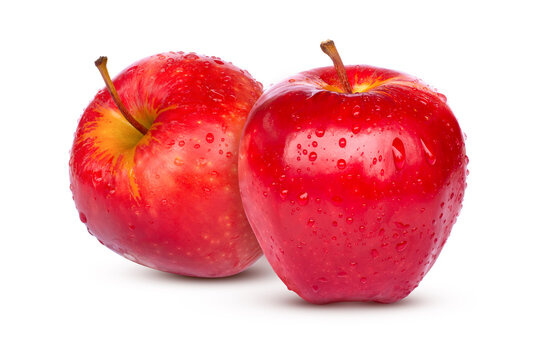 Two red apples with water droplets isolated on white background.