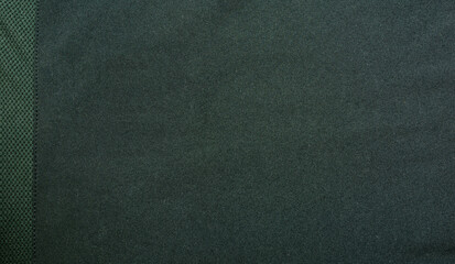 Clothing industry. Black material with thread as texture.