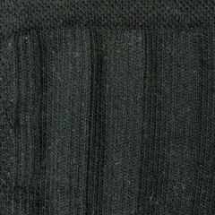 Texture on a black fabric used in the clothing industry. - 511464343