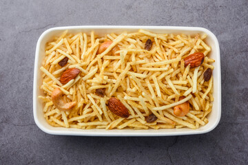 Indian style deep fried snacks falahari chivda, Chewda - chivda or mixture namkeen with dry fruits