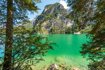 Fototapeta na wymiar Lago di Braies or Pragser Wildsee. Small alpine lake and mountain range of Sasso del Signore. Dolomites, UNESCO world heritage site, South Tyrol, Trentino-Alto Adige, Bolzano province, Italy, Europe.