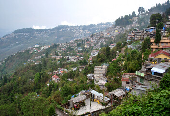 Fototapeta na wymiar A panoramic view of Darjeeling town looks mesmerizing in Darjeeling, India. The town was discovered by British in 1829 with population of 100 people which has grown to 20 lakhs approx. after 222 years
