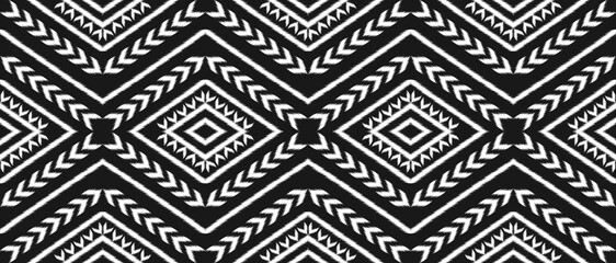 Geometric ethnic ikat seamless pattern traditional. Fabric American, mexican style. Design for background, wallpaper, illustration, fabric, clothing, carpet, textile, batik, embroidery.
