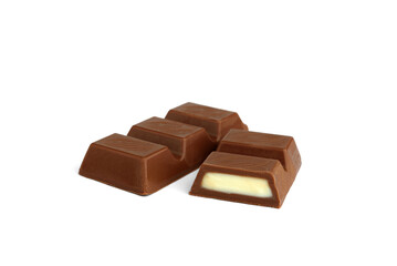 Chocolate pieces with milk filling isolated on white background.