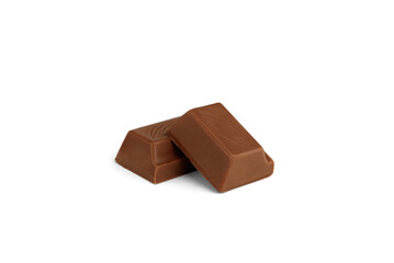 Chocolate pieces with milk filling isolated on white background.