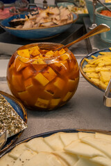 Typical Israeli breakfast buffet at any hotel.  Hard cheese buffet with a variety of different cheeses.

