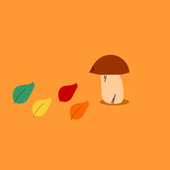 Mushroom and leaves on brown background