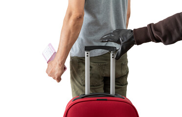 Rear view of a hand of a thief stealing a suitcase in the lobby of airport