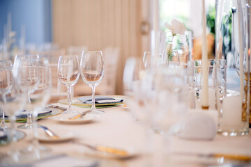 Catering services. glasses set and dishes plates in restaurant