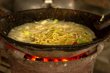 Bakmi Jawa or Bakmi Godhog, Indonesian traditional street food, boiled noodles cooked with spices typical of Javanese cuisine