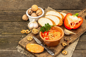 Traditional Middle Eastern dip Muhammara. Roasted red bell pepper with walnuts and spices