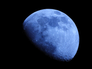 full Moon close up with dark sky in the background 
