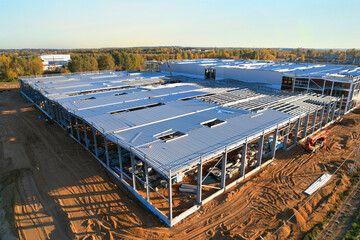 Warehouse Construction from metal structure. Industrial building on light gauge steel framing....