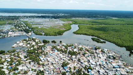 Amazing views from air shot by drone Pallam Island with perfect nature and buildings of village water green trees boats travel pictures best views houses streets roads river environment background 