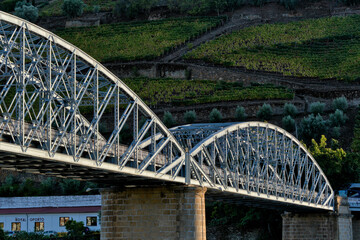 Pinhao bridge and terraced vineyards in Douro Valley Alto Douro in Pinhao, Portugal
