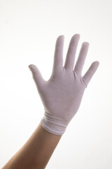 Hands gesticulating in white textile gloves on a white background