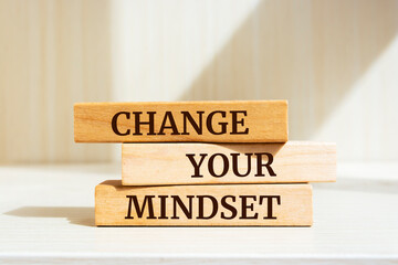 Wooden blocks with words 'change your mindset'.
