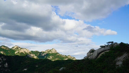 The grandeur of the mountain peaks and clouds of Bukhansan Mountain