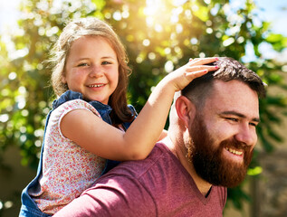 Making her girlhood a happy one. Shot of an adorable little girl enjoying a piggyback ride from her...