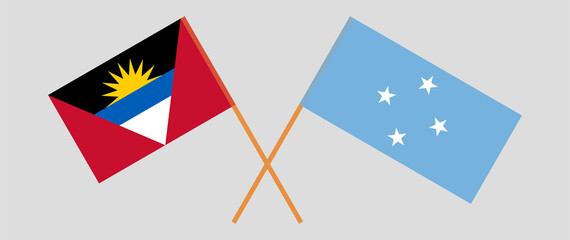 Crossed flags of Antigua and Barbuda and Micronesia. Official colors. Correct proportion