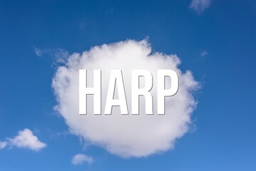 Naklejka na ściany i meble HARP - word on the background of the sky with clouds.