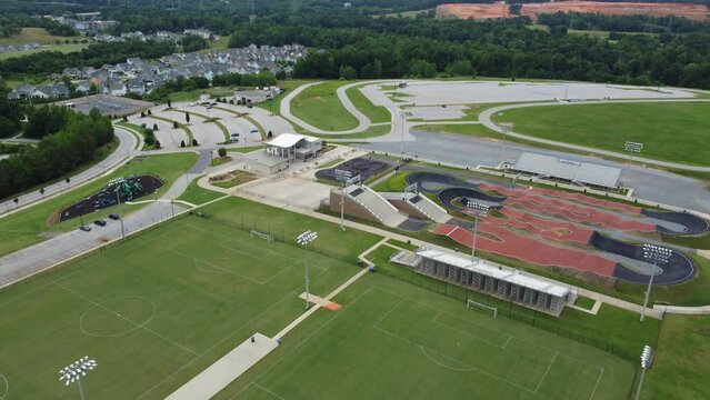 Aerial push over new Rock Hill sporting complex in Riverwalk community. Soccer fields, BMX track, playground.